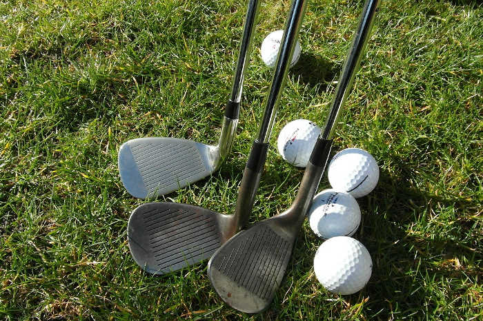 image of golf clubs and balls
